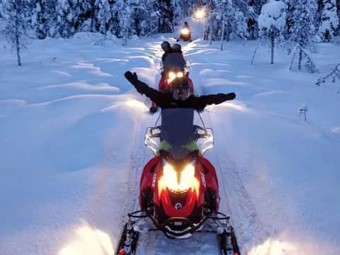 SnowVillage Visit By Snowmobiles