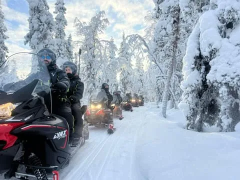 Levi: Snowmobile Safari In Snowy Forest