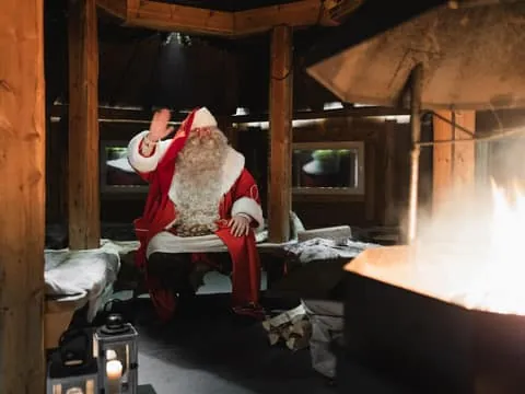 Levi: Santa's Cabin Visit with Snowmobile or Husky Sled Ride