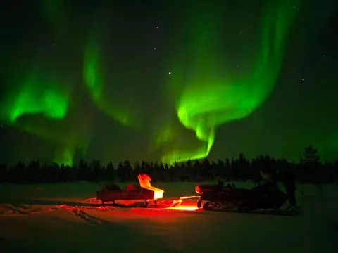 Muotkantunturi Park, Inari - Intense Northern Lights on a Sami sleigh