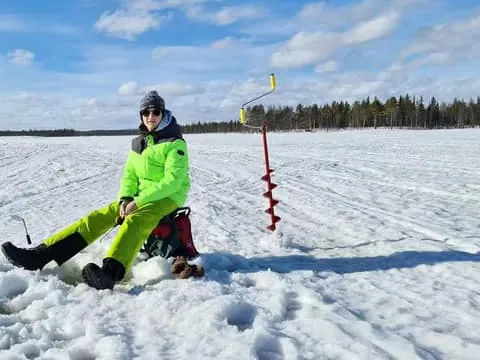 Levi: Snowmobile and Ice Fishing Safari with Campfire Snacks