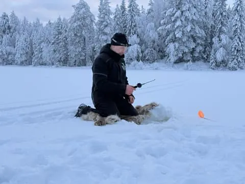 Authentic Ice Fishing & Snowmobile Sleigh Tour
