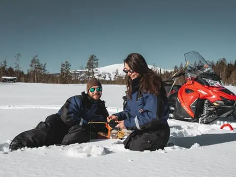 Levi: Snowmobile Safari with Ice Fishing and Outdoor Lunch