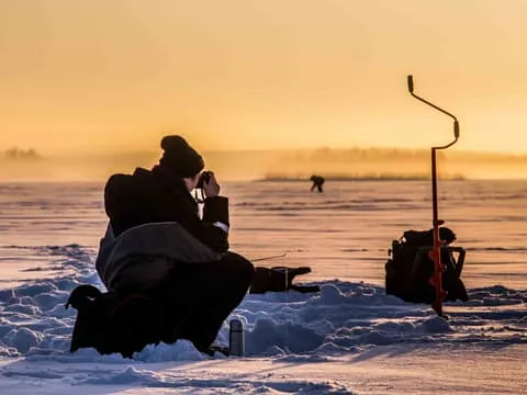 Levi: Ice Fishing on a Frozen Lake with BBQ and Photos