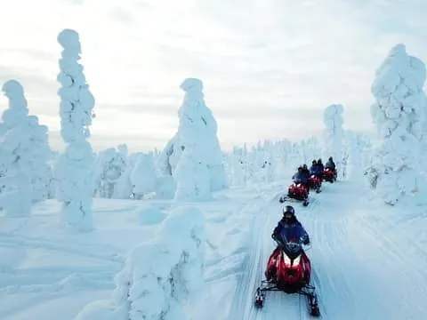 Ylläs: Snowmobile Adventure with Ice Fishing