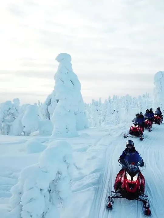 Ylläs: Snowmobile Adventure with Ice Fishing