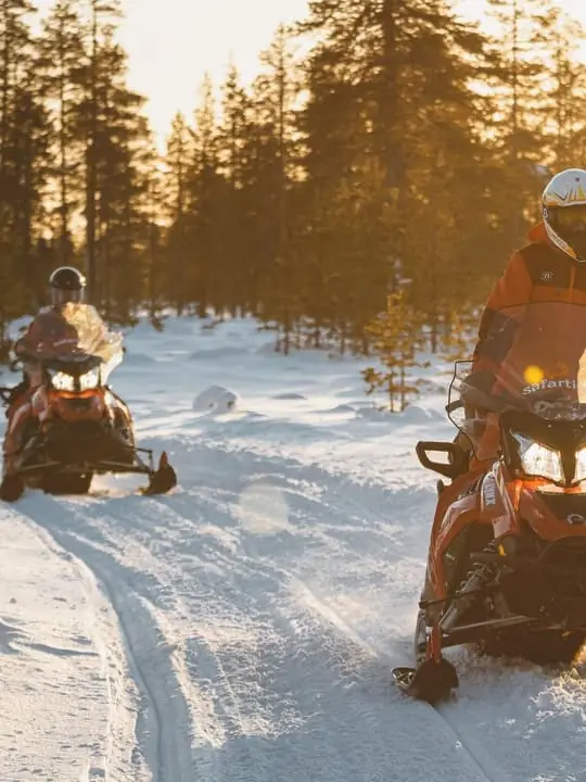 Ylläs: Snowmobile Tour to Arctic Snow Village & Snack