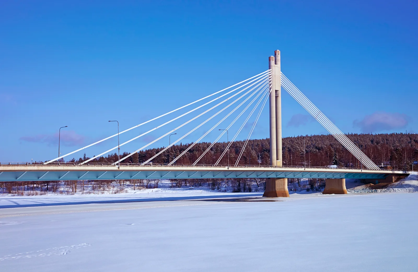 Lumberjack's Candle Bridge over the frozen Kemijoki in Rovaniemi