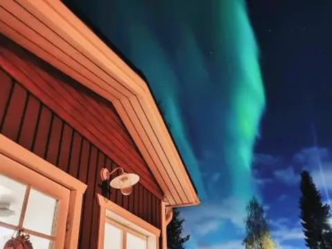 Red wooden house in Rovaniemi