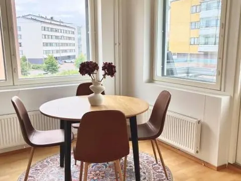 2ndhomes Stylish Riverside Apartment with 2BR, Sauna & Warm Parking